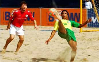 A Brazilian player in beach soccer action.